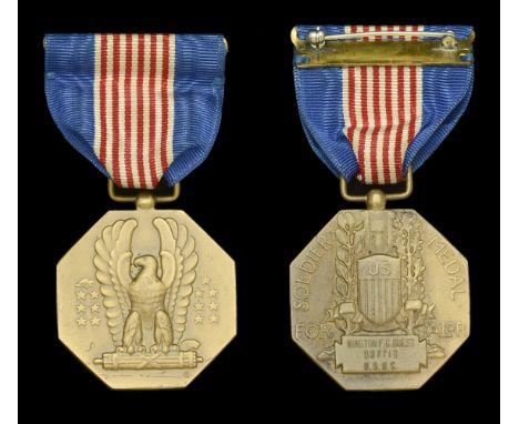 United States of America, Soldier’s Medal, bronze, the reverse engraved ‘Winston F. C. Guest 037718 U.S.M.C.’, with riband ba