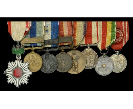 An unattributed Japanese Order of the Rising Sun group of eight  Japan, Empire, Order of the Rising Sun, Sixth Class breast b