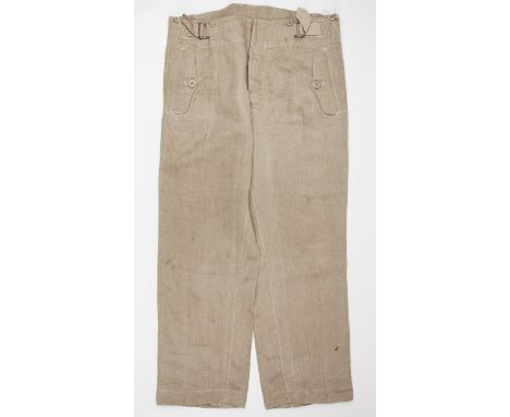 GERMAN TWILL MILITARY FIELD TROUSERSA pair of unidentified German military field trousers, a light-weight beige twill in a st