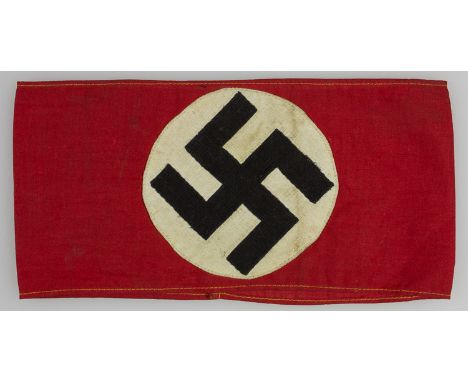 N.S.D.A.P. ARMBANDThree-piece construction N.S.D.A.P. armband, 15 1/2" long, 3 3/4" wide, joined at the rear. Some soiling an