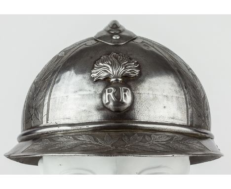 ENGRAVED FRENCH WORLD WAR "ADRIAN" PARADE HELMETWorld War I-era M15 "Adrian" helmet, with a metal comb affixed to the crown w