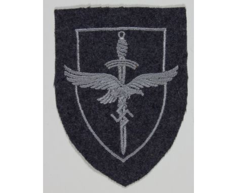 LUFTWAFFE FLAKHELFERIN PATCHLuftwaffe flak assistant's shouler patch, unissued.