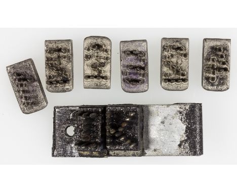 CONCENTRATION CAMP METAL TATTOO STAMPSGroup of eight stamps, constructed of metal pins set into a metal base, assembled in th