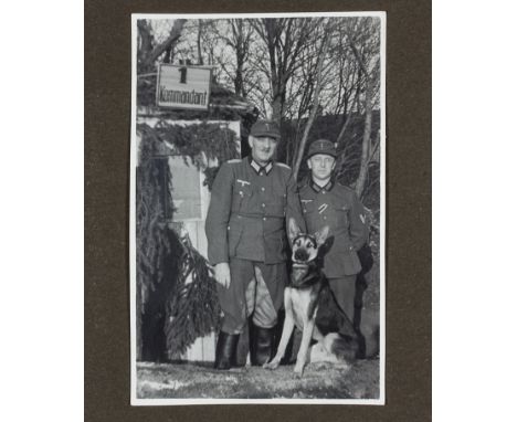 GERMAN DOG HANDLER WITH HIS SHEPARDGerman army soldier's photo album containing 60+ photographs, 18 showing the same soldier 