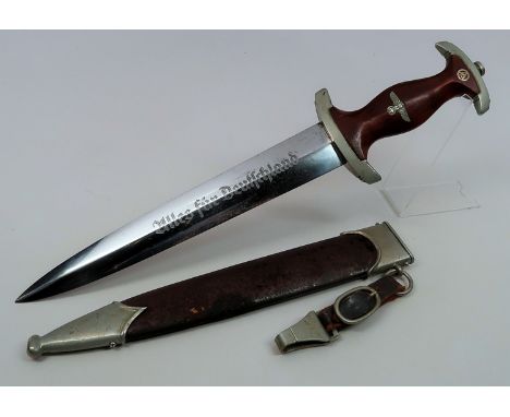 S.A. DAGGER WITH HANGER BY RASSPERare S.A. dagger, scabbard and hanger from maker Ernst Hugo Rasspe of Solingen. The grip of 