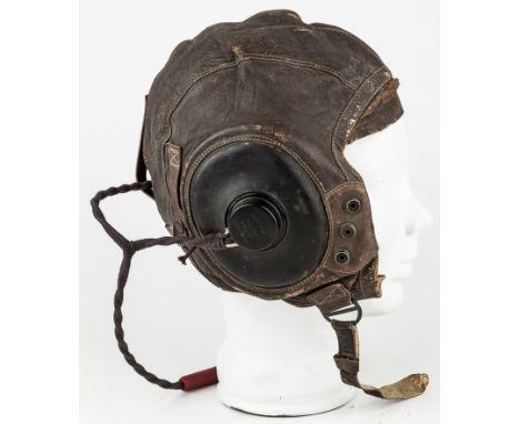 AMERICAN A-11 FLIGHT HELMETBrown leather flying helmet, size extra-large, with black rubber Harvard-style ear cups, mounted w