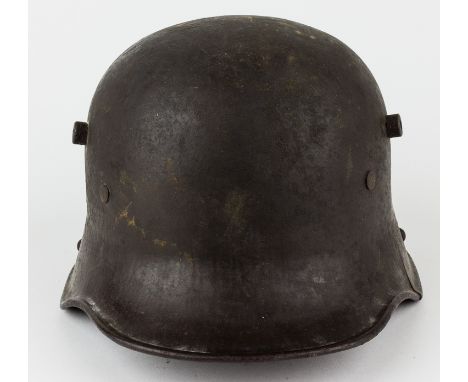 GERMAN M1916/1917 STAHLHELMGerman World War I-era M1916/1917 "Stahlhelm", or steel helmet, identifiable as such by the extern