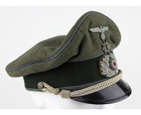 GERMAN TRANSPORT OFFICER'S VISOR CAP WITH EDELWEISSGerman Army tranport officer’s visor hat with edelweiss. This cap has a gr