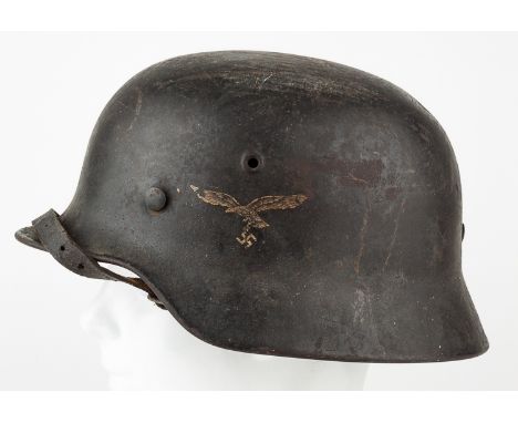 LUFTWAFFE M40 HELMETLuftwaffe M40 helmet, original dark blue-gray paint with very light sand texture, second pattern eagle an