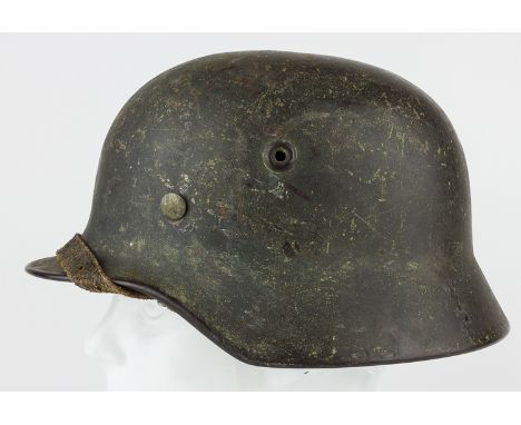 SAND-FINISH M1940 HELMETGerman M1940-style combat helmet, with no decals, with a light sand finish overall. The helmet is pai