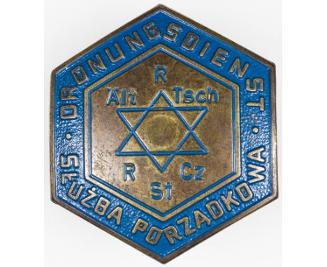 WARSAW GHETTO JEWISH POLICE HAT BADGERare relic from the Warsaw Jewish ghetto, a Jewish "Ordnungsdienst" hat badge. The 1 1/2