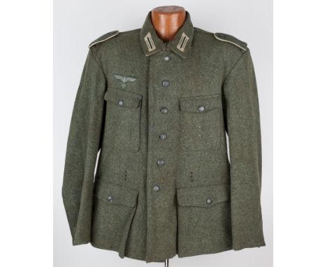 GERMAN LATE-WAR M44 NON-COM TUNICGermany army M44 non0commissioned officer's tunic, a typical late-war "rough" field-grey woo