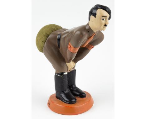 "PIN IT ON HITLER" PIN CUSHIONWar-time anti-Hitler souvenir, a comical painted cast plaster figure of Hitler showing him bent