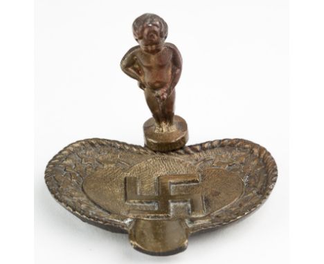 ANTI-NAZI SOUVENIR ASHTRAYBronze ashtray, 3 1/4" wide, 2 1/2" tall, shows the Brussels "Manneken Pis" urinating upon a static