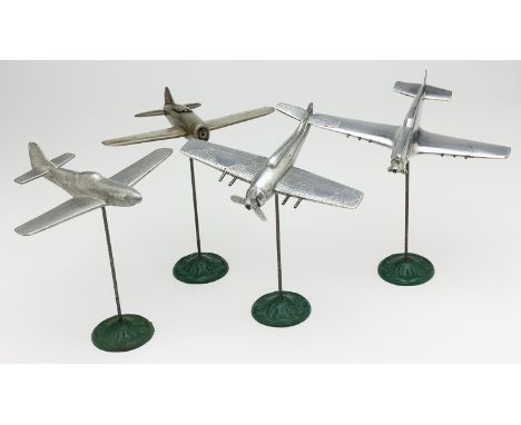 THEATER-MADE METAL PLANE MODELSLot of four theater-made models of U.S. Navy carrier fighter planes, each with wing spans abou