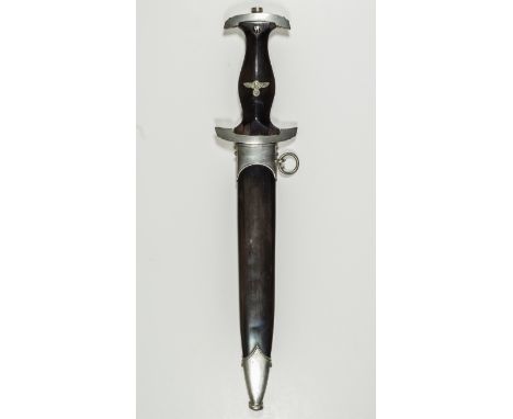 SS SERVICE DAGGEREarly M33 SS service dagger. The hardwood ebony-stained grip is fitted with an original SS runes button whic