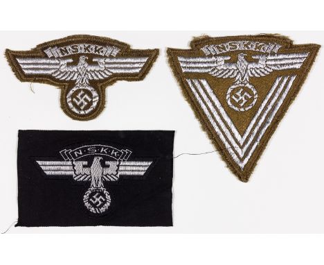 N.S.S.K. CLOTH INSIGNIAThree pieces of NSKK insignia, includes silver flat wire embroidered NSKK shoulder patch with an eagle