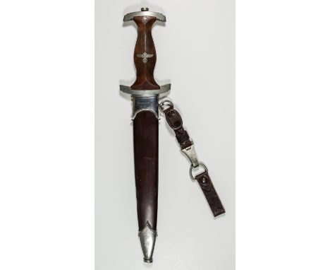 ENGRAVED PRESENTATION S.A. DAGGERPresentation S.A. dagger. The dagger bears a dark brown wood grip inset with a somewhat oxid