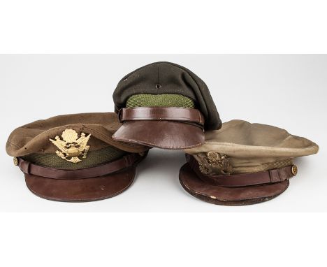 AMERICAN VISOR CAPSGood group of three World War II-era American military visor caps. The first features a cover of taupe cot