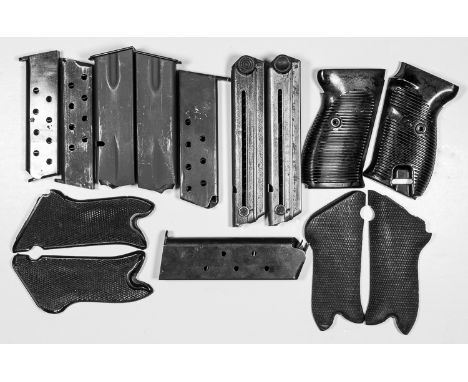 WORLD WAR I AND II PISTOL COMPONENTSGood group of grips and magazines from a variety of World War I and World War II-era pist