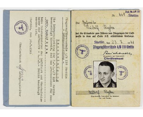 LUFTWAFFE PILOT'S FLYING LICENSELuftwaffe pilot's "Flugzugfuhrerschein" (aircraft license), 20pp. 12mo., issued to Rudolf Ryb