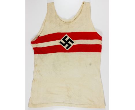 HITLER YOUTH ATHLETIC SHIRTWhite cotton sleeveless athletic shirt, approx. 21 1/5" x 13", with two printed red bands encircli