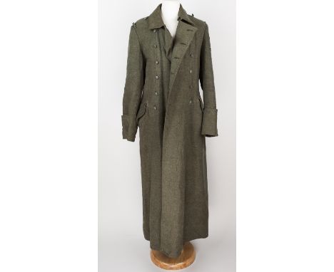 SS M40 WINTER GREATCOATThird Reich-era field-gray wool M40 greatcoat, double-breasted with six green-painted pebbled metal bu