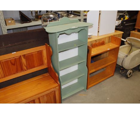 A green painted book shelf