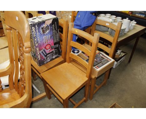 Four ladder back kitchen chairs 