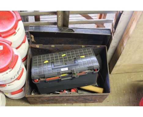 A metal storage box and contents of tools to include hammers, hand brace, plunger and a plastic tool box and contents of furt