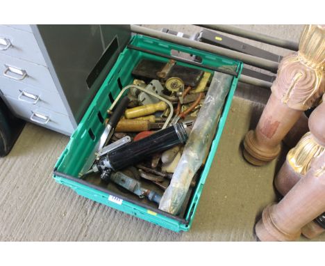 A box containing various vintage tools to include grease gun, hand braces, chisels various brassware etc. 