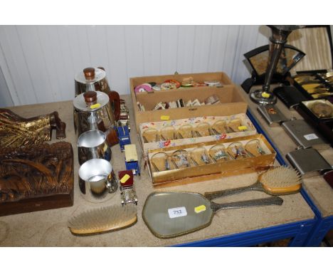 A collection of dressing table items, tea ware, vintage badges, match books and shot glasses etc 