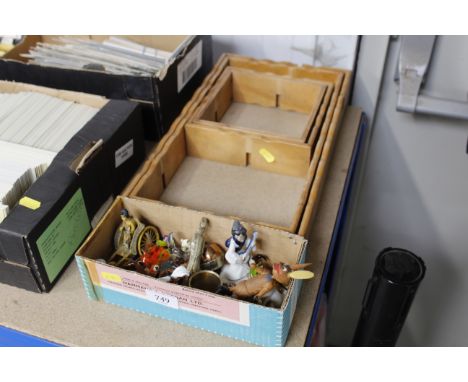 A wall shelf and a collection of various small ornaments 