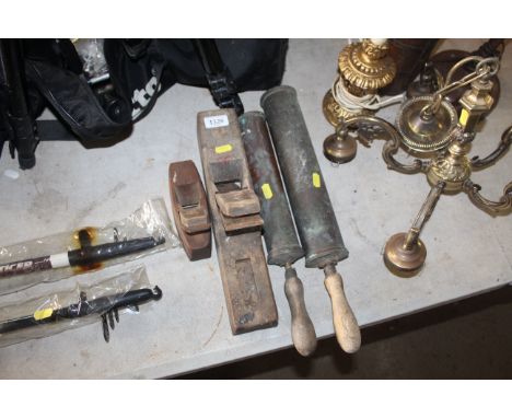 Two wooden smoothing planes and two vintage hand pump sprayers 