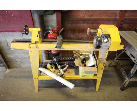 A Perform CCL240V lathe with variable speed control, accessories, tools clamps and instruction guide 