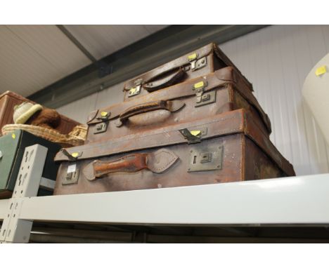 Three vintage leather cases