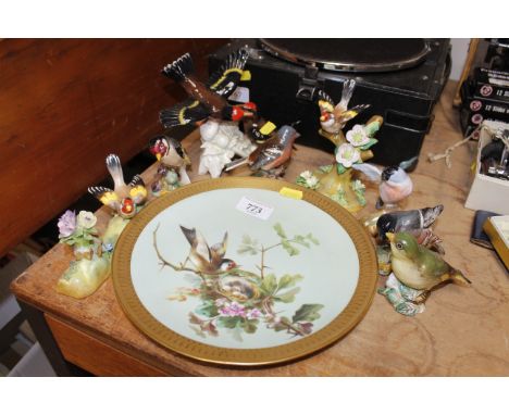 A Minton plate decorated with bird and nest within gilt border and a collection of bird ornaments including Goebel, Crown Sta