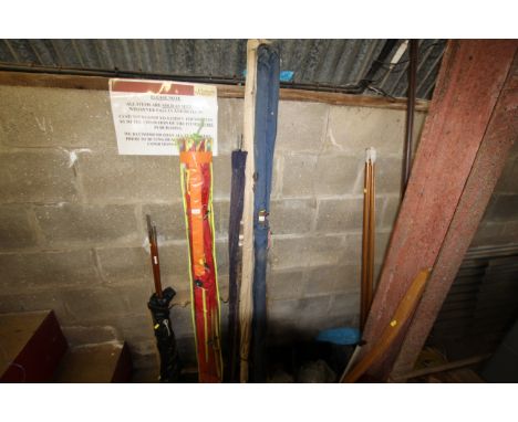 A quantity of various vintage fishing rods