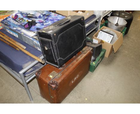 A vintage suitcase and briefcase