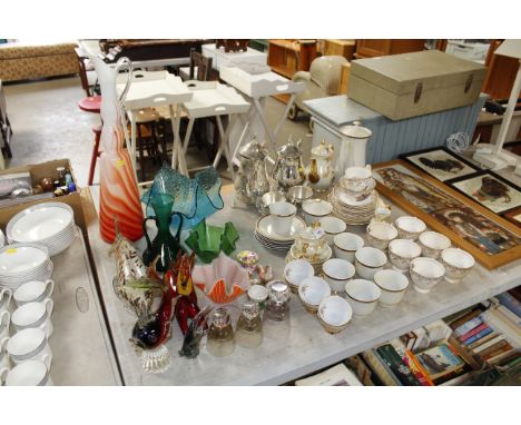A collection of various patterned floral decorated tea ware and a collection of Art Glass ware to include handkerchief vases,