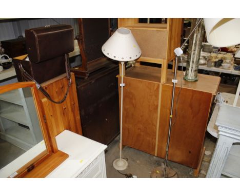 A standard lamp and shade