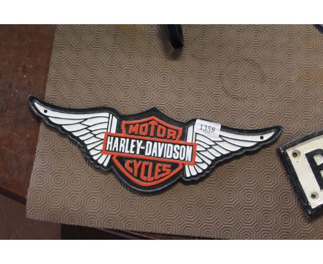 A painted cast iron plaque for "Harley Davidson Motorcycles" (226)