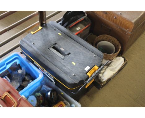 A plastic mobile tool chest and contents of tools to include hammers, pliers, large brush etc.