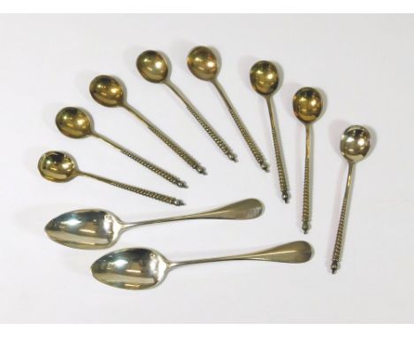 GERMAN SPOONS ETC. A set of eight German 800 Standard coffee spoons, each bowl back with scale decoration. Also, two French s