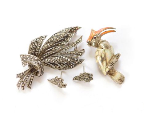 MARCASITE ETC. A large marcasite leaf spray brooch & a pair of marcasite ear studs. Also, a silver hornbill brooch, enamelled