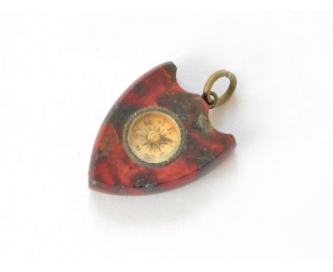 CORNISH SERPENTINE. A Cornish serpentine, Antique Red shield-shaped compass fob.  Please note that all items in this auction 