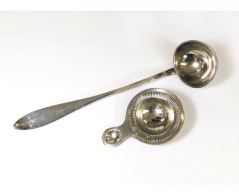 CONTINENTAL SILVER. A German silver 800 Standard strainer & an Austro-Hungarian large ladle.  Please note that all items in t