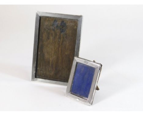PHOTOGRAPH FRAMES. Two engine turned photograph frames. 14.5 x 9.5cm & 8 x 5.5cm.  Please note that all items in this auction