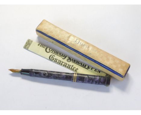 CONWAY STEWART. A lilac marbled Conway Stewart, The 'Duro' pen, No. 30 with 14ct. gold Duro nib. Original box & leaflet, the 