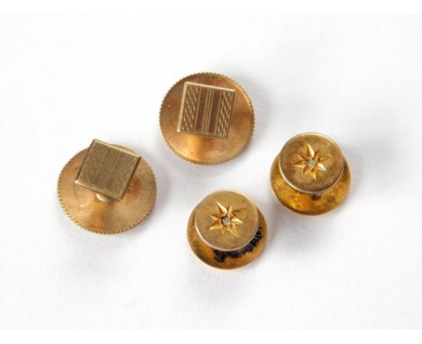 GOLD STUDS. Two 9ct. gold studs with engine turned decoration & two 15ct. gold studs, each set a small diamond.  Please note 